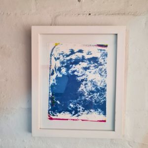 Blue abstract screenprint work on paper. Framed in white