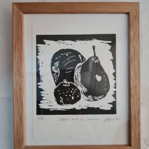 Linocut print framed in light timber.